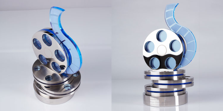 Custom-designed NFTS award featuring film reel; made in aluminium and acrylic